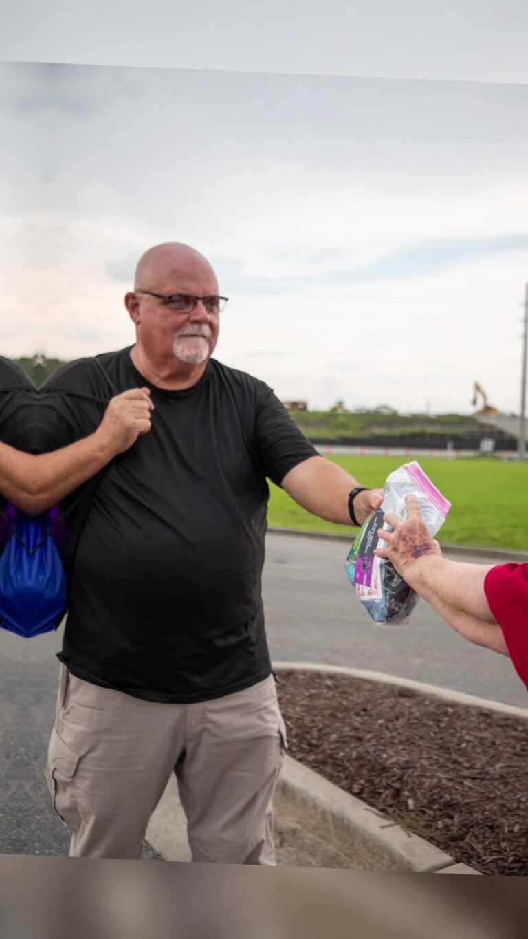 Carolina HOPE leader handing out a blessing bag
